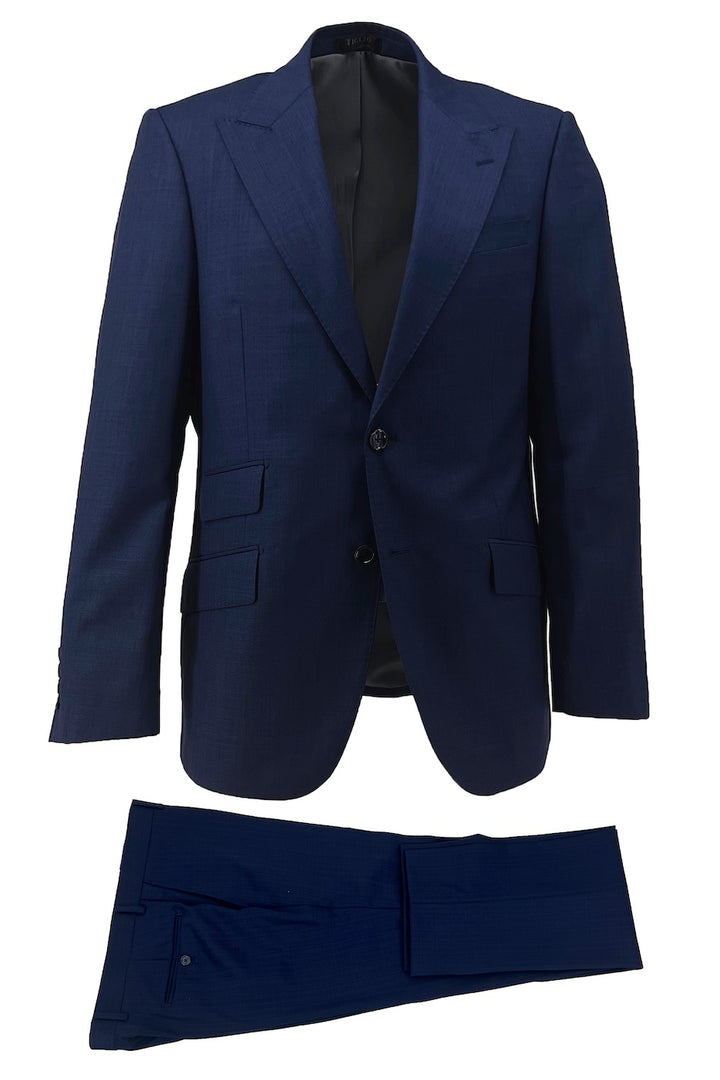 The Tiglio Luxe New Blue Terrano Slim Fit Pure Wool Suit TIG4002 features a single-breasted jacket and matching trousers, showcased against a white background—ideal for those who value luxury men's fashion.