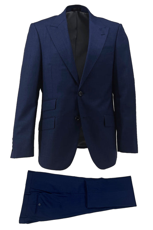 The Tiglio Luxe New Blue Terrano Slim Fit Pure Wool Suit TIG4002 features a single-breasted jacket and matching trousers, showcased against a white background—ideal for those who value luxury men's fashion.