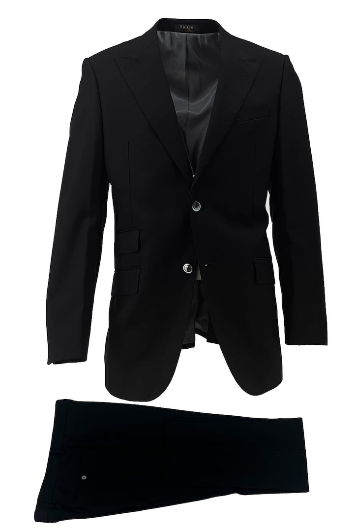 The Tiglio Luxe Black Terrano Slim Fit Pure Wool Suit TIG4001, a men's two-piece suit with a single-breasted, two-button blazer and matching trousers, is shown against a white background.