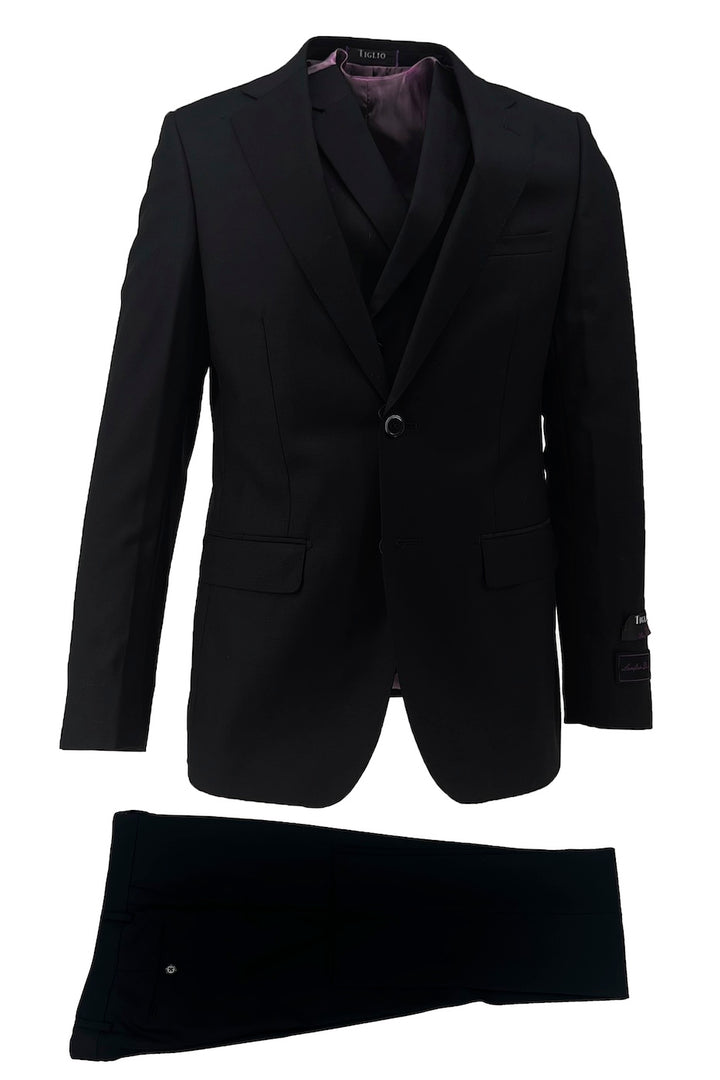 The Tiglio Luxe Black Porto Slim Fit, Pure Wool Suit and Vest TIG1001 features a single-breasted jacket, matching waistcoat, and trousers. This luxury men's suit by Tiglio Luxe is shown on a white background.