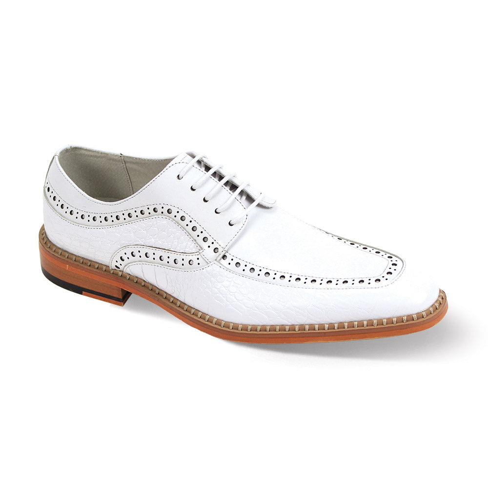 The Giovanni Terence by GIOVANNI is a white leather brogue shoe featuring decorative perforations, a lace-up closure, and a tan sole with a small heel.