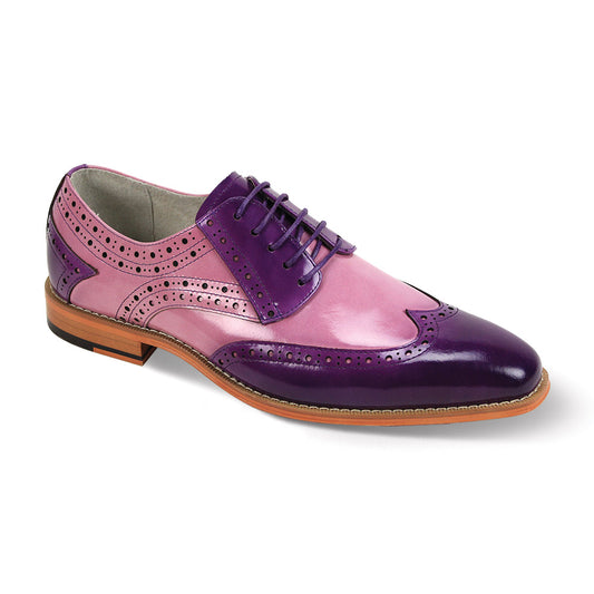 The Giovanni Troy Purple/Orchid Leather Shoes by GIOVANNI feature a pink and purple wingtip brogue design with decorative perforations, lace detailing, and a wooden sole.