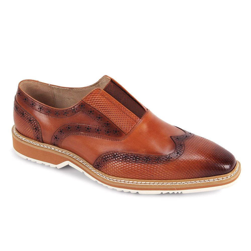 The GIOVANNI Giovanni Tyron Tan Leather Shoes are smooth slip-ons with brogue detailing, embossed accents, and a light-colored sole.