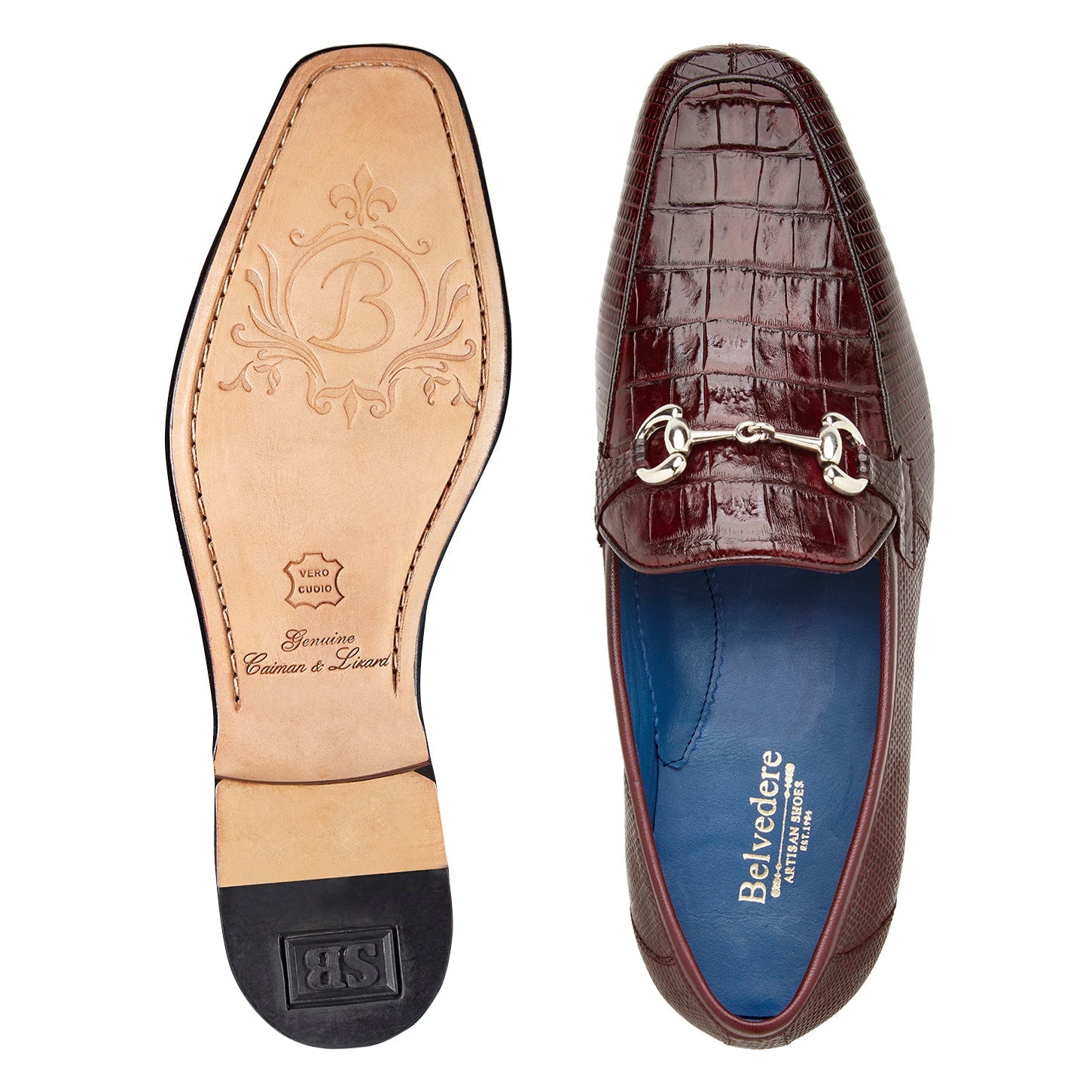 The BELVEDERE Udine 1030 is a burgundy loafer crafted from genuine caiman crocodile and lizard, featuring a textured pattern, leather sole, low black heel, and a metallic buckle detail.