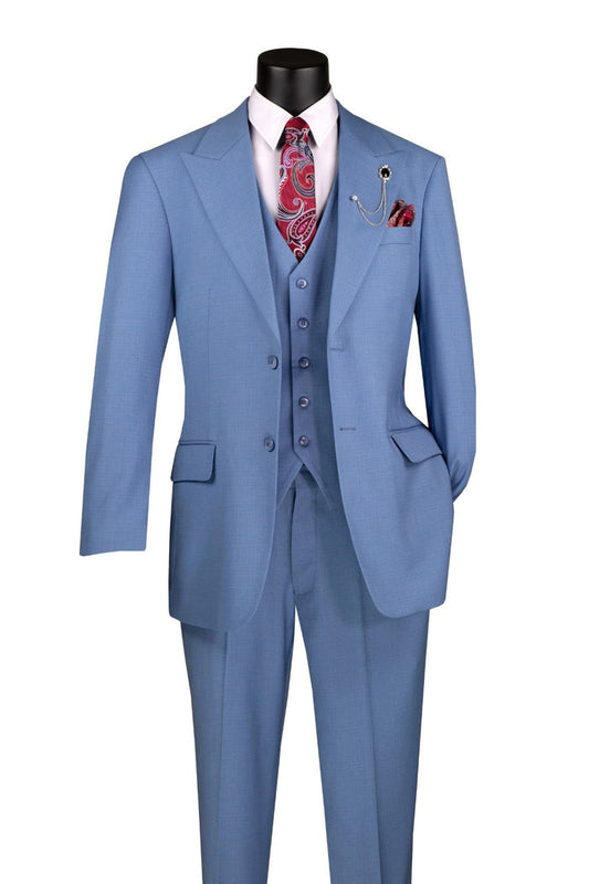 A Vinci Suits' Regular Fit 3 Piece Suit in Dusty Blue V2RK-4, featuring a blazer, vest, and adjustable waist band pants, is stylishly showcased on a mannequin with a paisley tie and matching pocket square.