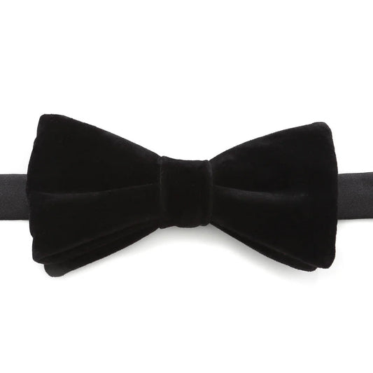 The VDP Black Velvet Bow Tie by Cufflinks.com features a classic shape and luxurious black velvet, shown against a white background.