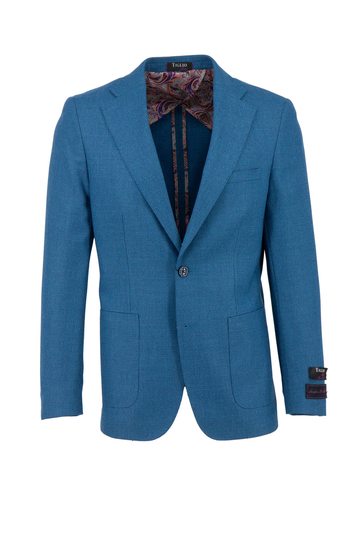 The Tiglio Luxe Crystal Teal Hopsack Veneto THP Slim Fit, half-lined pure wool jacket (TL3377) features notched lapels, a single button closure, and two front pockets. Expertly crafted from Italian fabrics, its lining boasts a multicolored paisley pattern reflecting sartorial traditions.