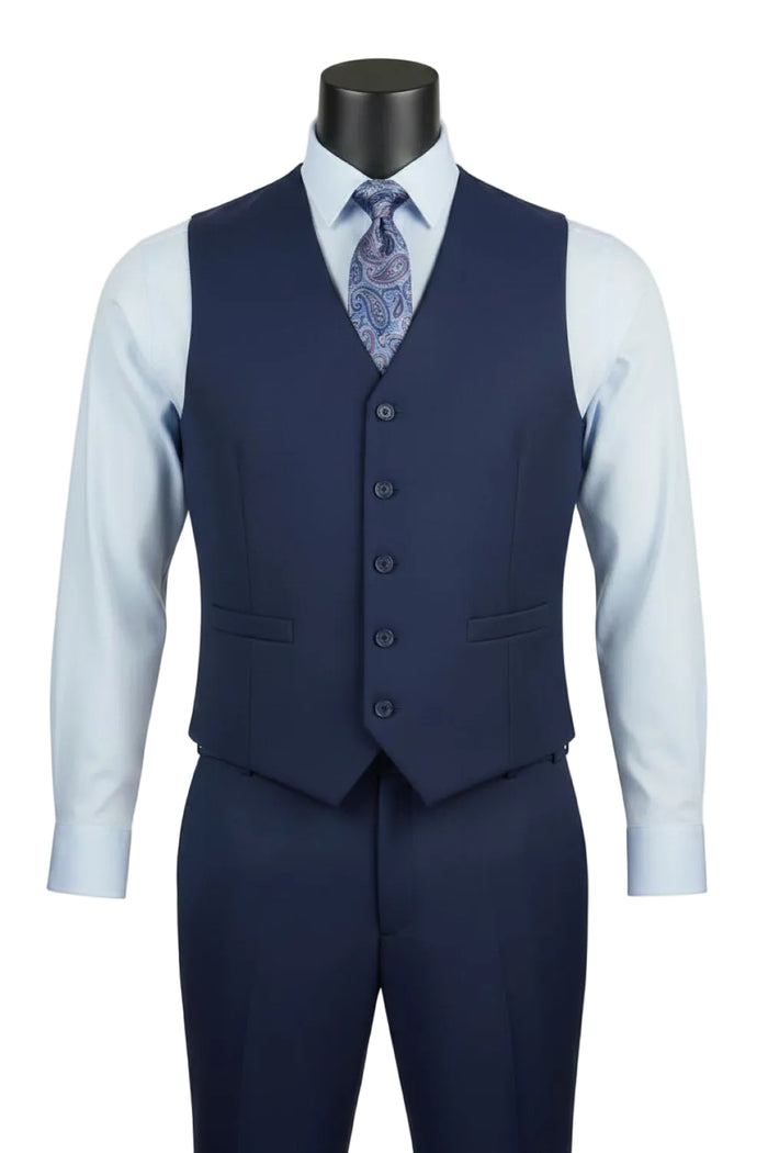The Vinci Suits Regular Fit Navy 3 Piece Suit 2 Button with Adjustable Waistband Pants F-V2TR is shown on a mannequin with a light blue shirt and paisley tie.