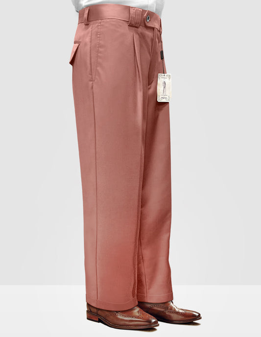 The individual is wearing Statement Clothing's Solid Color Wide Leg Pants (WP-100-MAUVE) in a salmon shade, crafted from Italian wool fabric, and paired with brown dress shoes. The tag is still attached to these stylish trousers.