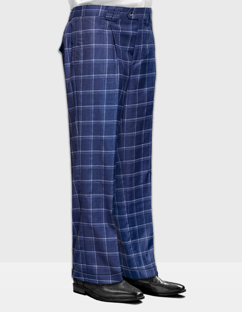 The person is wearing the Statement Clothing Wide Leg Plaid Pants (WP-101-Indigo) with pleats, crafted from Italian wool, and they have paired them with black shoes against a plain background.