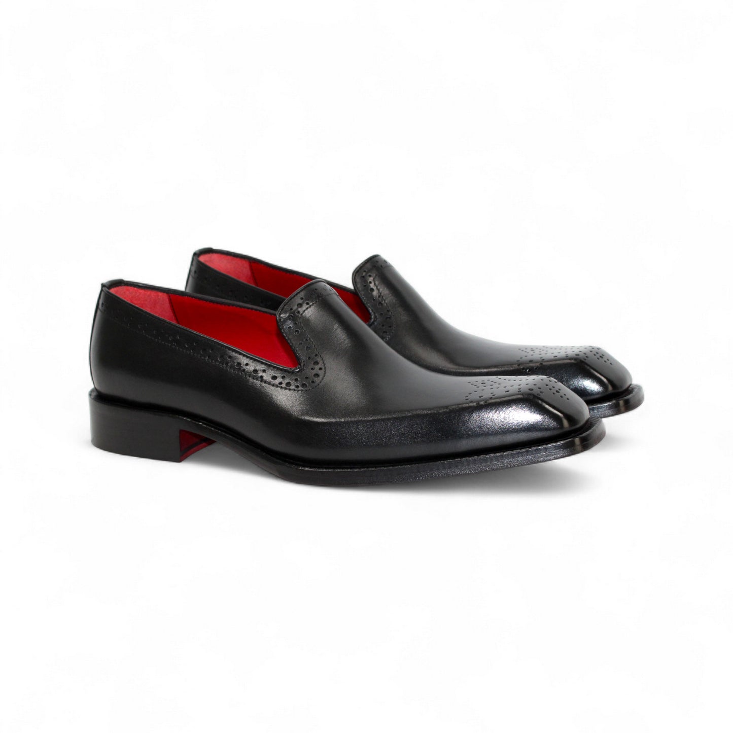 The Emilio Franco A014 Black loafer by Emilio Franco features handcrafted genuine black leather, subtle perforated detailing, a low heel, and red interior lining, showcased on a white background.