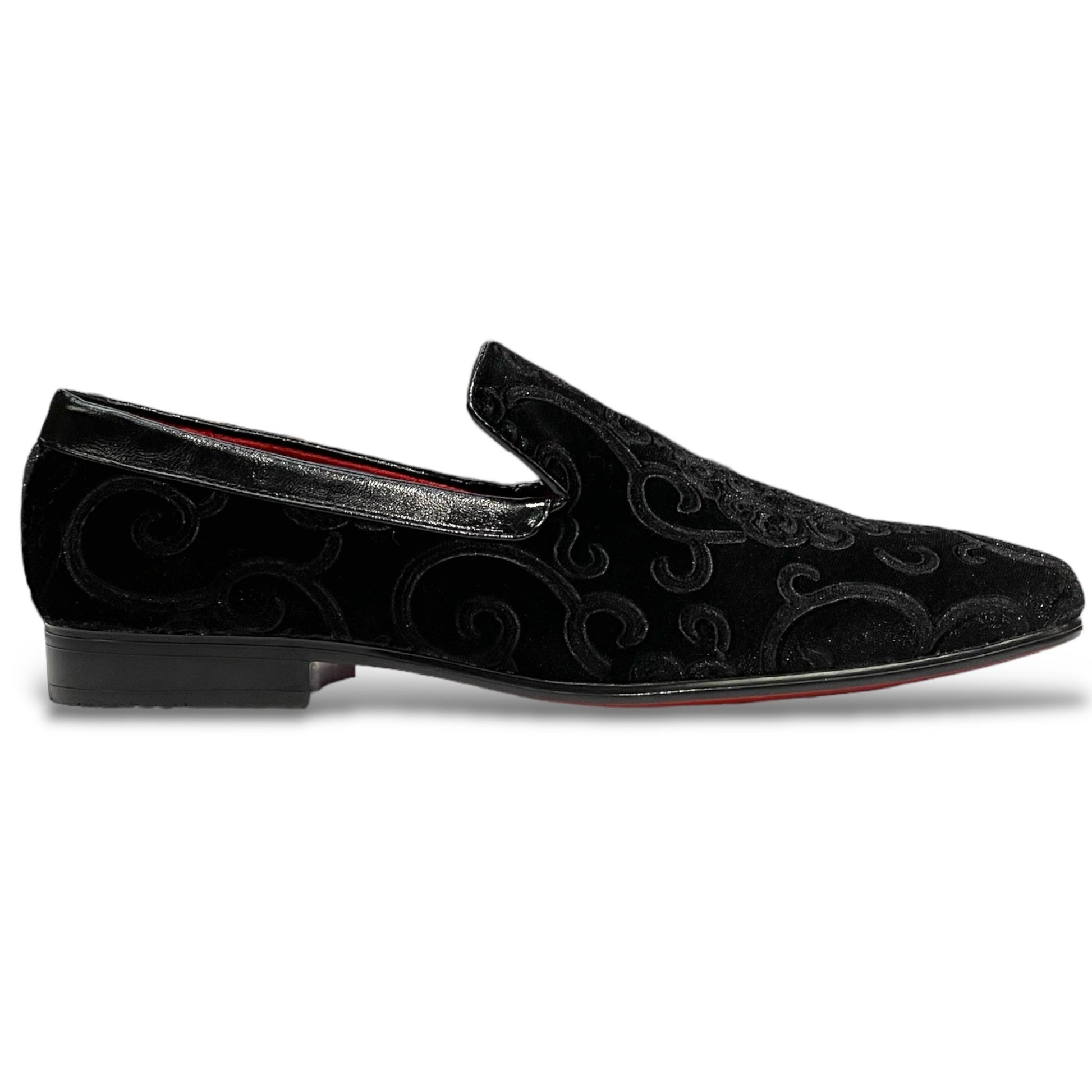 The After Midnight 7017 Black Paisley loafer by AFTER MIDNIGHT features a black satin finish, subtle swirling pattern, sleek buckle accent, and low heel.