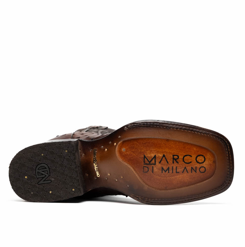 A pair of Marco Di Milano Alabama Kango Tabac men’s boots, handcrafted with genuine ostrich skin foot and dark upper, one upright and one displaying the branded sole, showcase classic Western cowboy style.