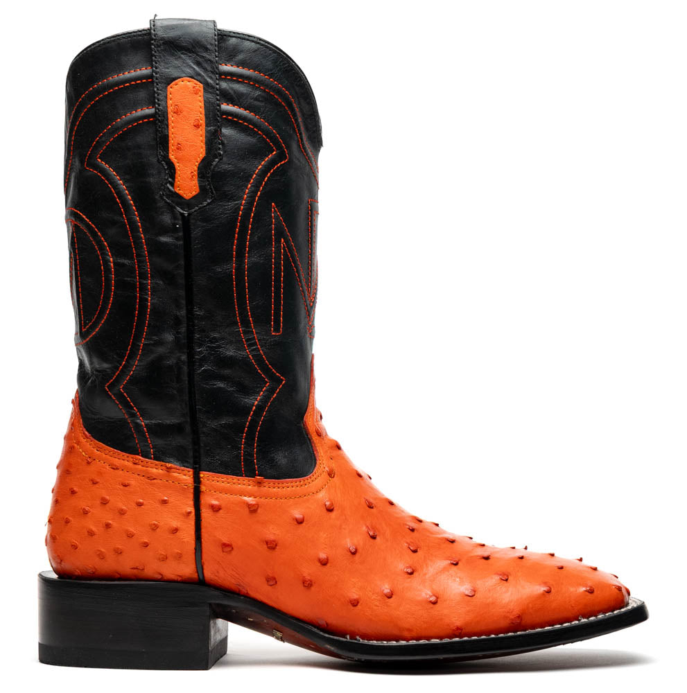 A pair of Alabama Orange cowboy boots by Marco Di Milano featuring a textured orange and black genuine ostrich upper and a visible logo on the leather sole.