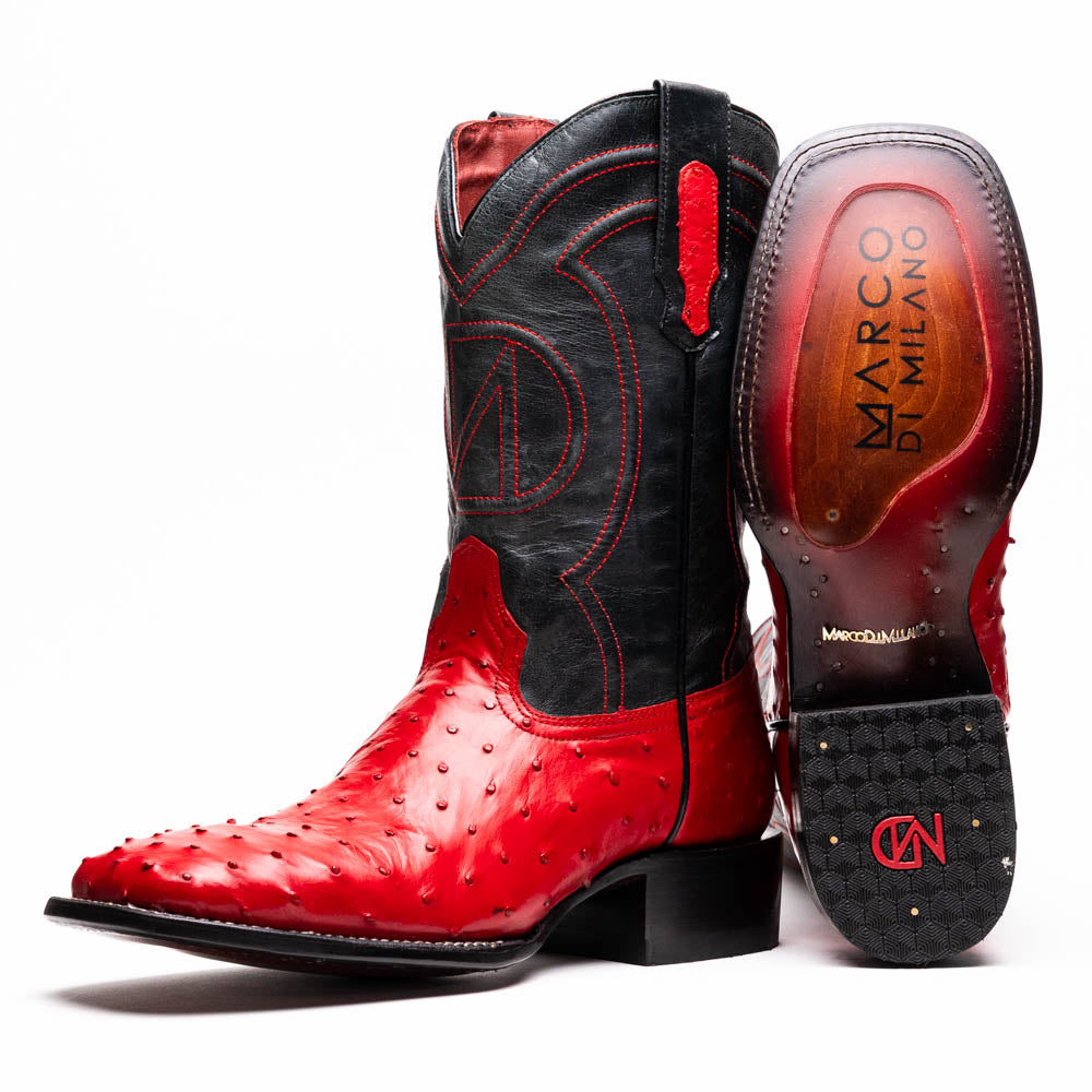The Marco Di Milano Alabama Red boots feature handcrafted red and black textured leather; one stands upright while the other reveals the branded sole—a modern take on classic Western style.