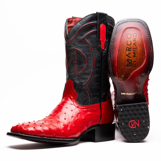 The Marco Di Milano Alabama Red boots feature handcrafted red and black textured leather; one stands upright while the other reveals the branded sole—a modern take on classic Western style.