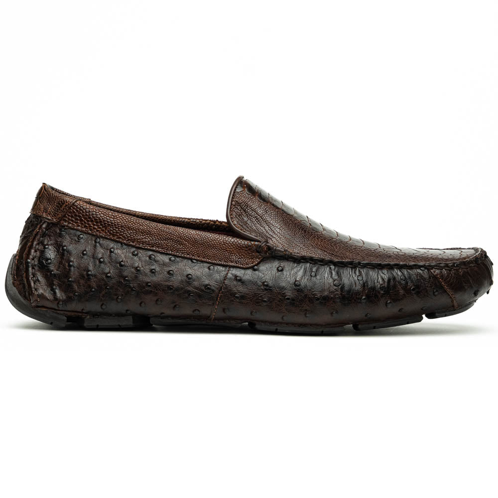 The Alba Kango Tabac by Marco Di Milano: brown textured leather loafers with visible stitching, one flat and one side-propped to reveal the sole—luxury footwear with artisanal hand-painted finishes.