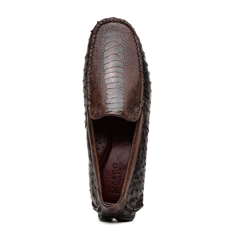 The Alba Kango Tabac by Marco Di Milano: brown textured leather loafers with visible stitching, one flat and one side-propped to reveal the sole—luxury footwear with artisanal hand-painted finishes.