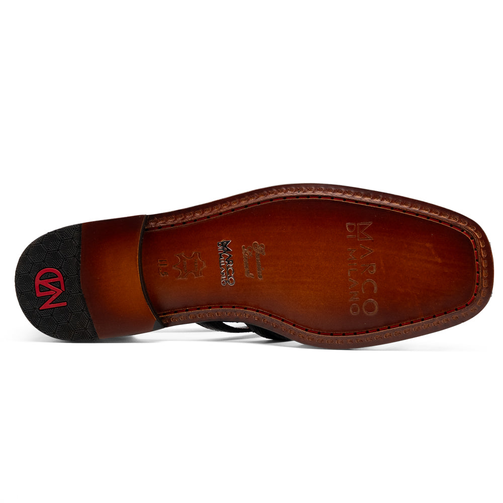Albero Black handcrafted black textured leather sandal featuring a caged, woven strap design.