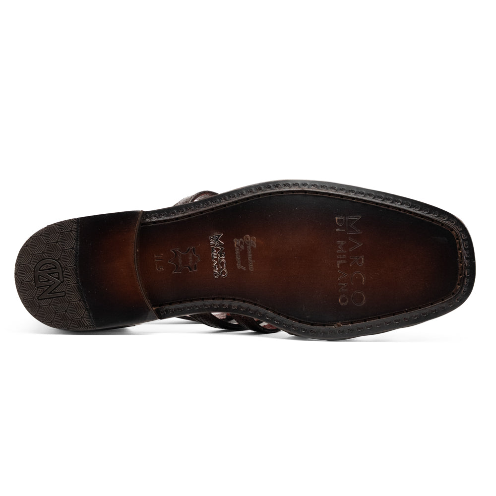Albero Brown handcrafted dark brown goat leather gladiator-style sandal with a buckled ankle strap and a low heel.