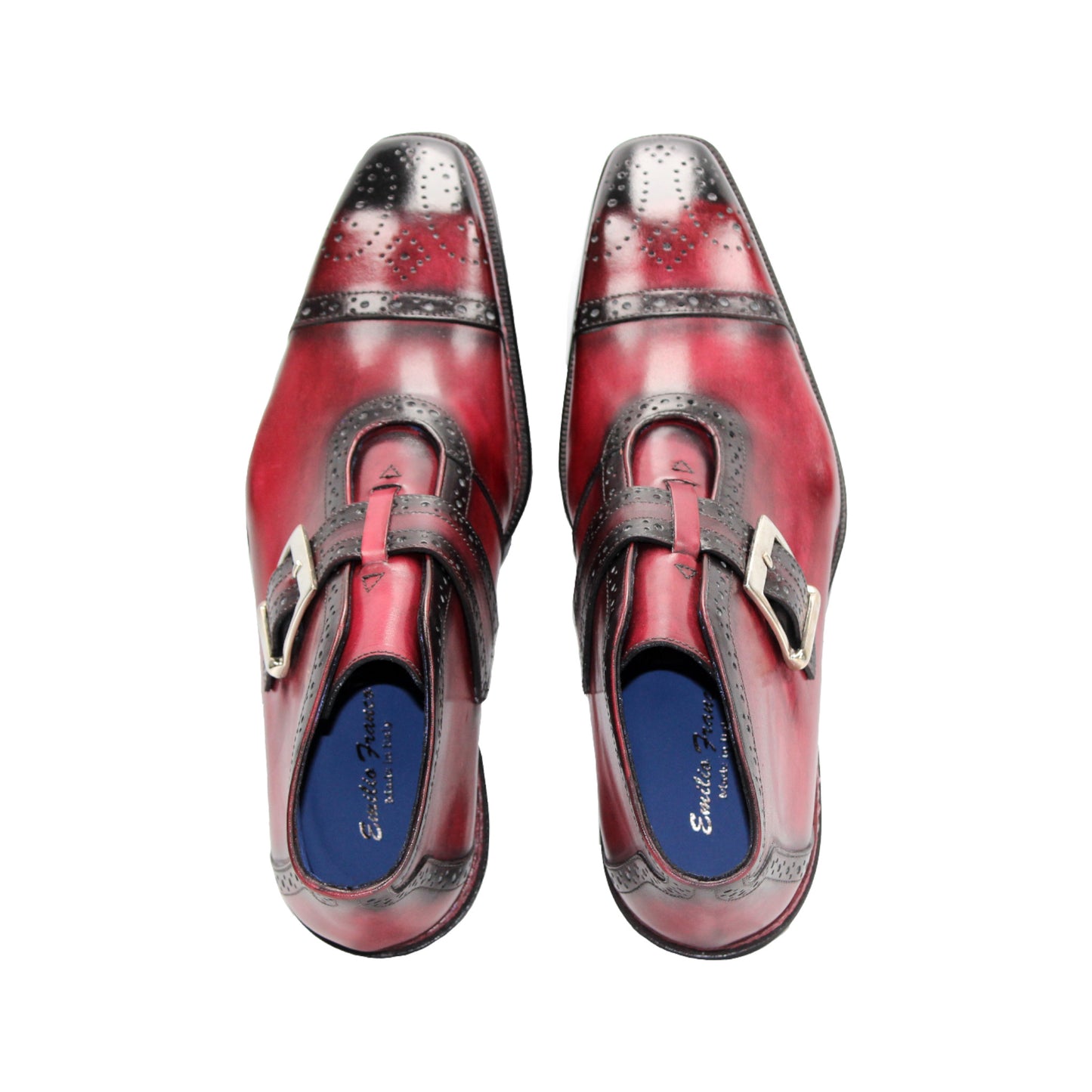 The Emilio Franco Aldo Antique Red is a genuine leather dress shoe with a black cap toe, decorative perforations, side buckle, and black heel—ideal for anyone seeking the elegance of Italian footwear.