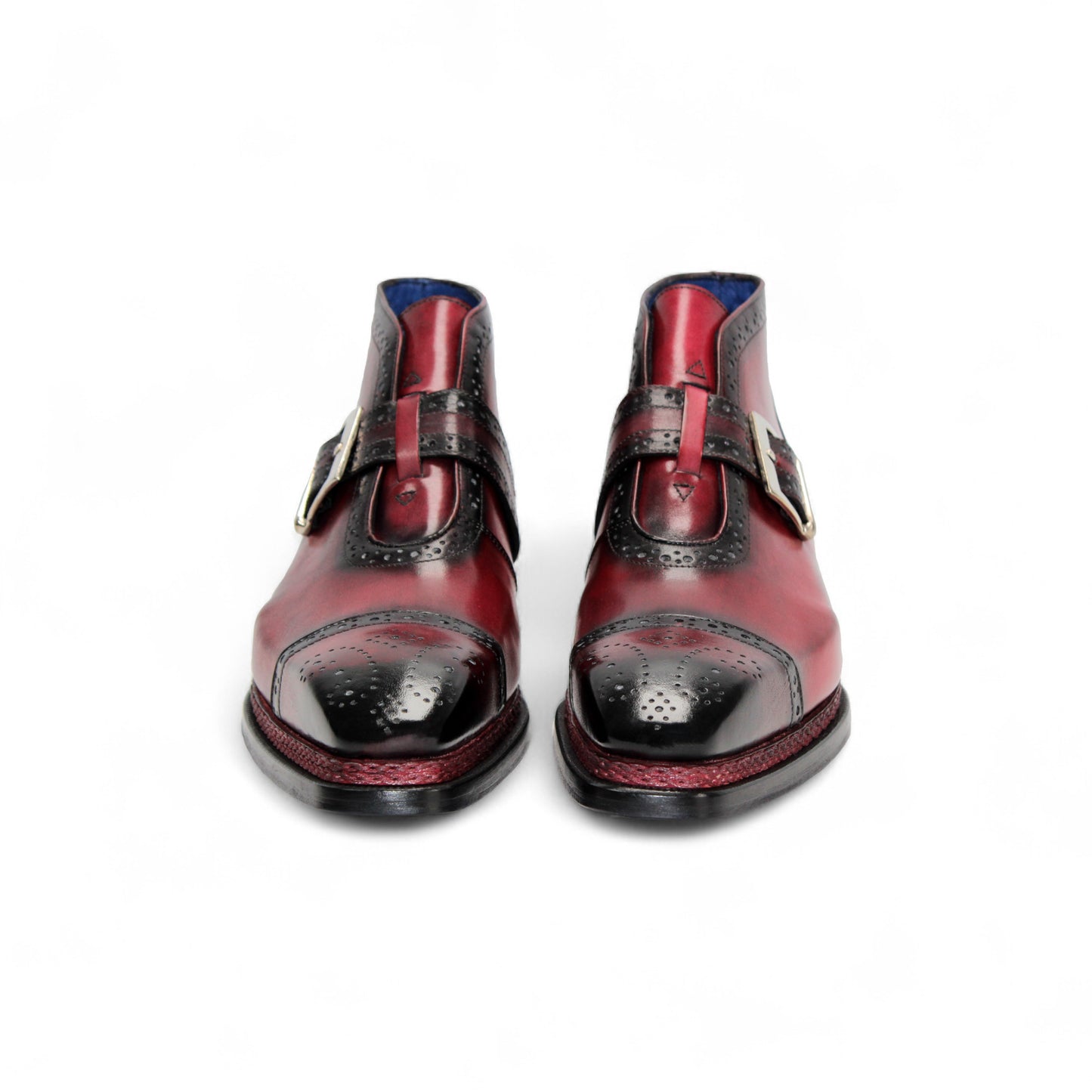 The Emilio Franco Aldo Antique Red is a genuine leather dress shoe with a black cap toe, decorative perforations, side buckle, and black heel—ideal for anyone seeking the elegance of Italian footwear.