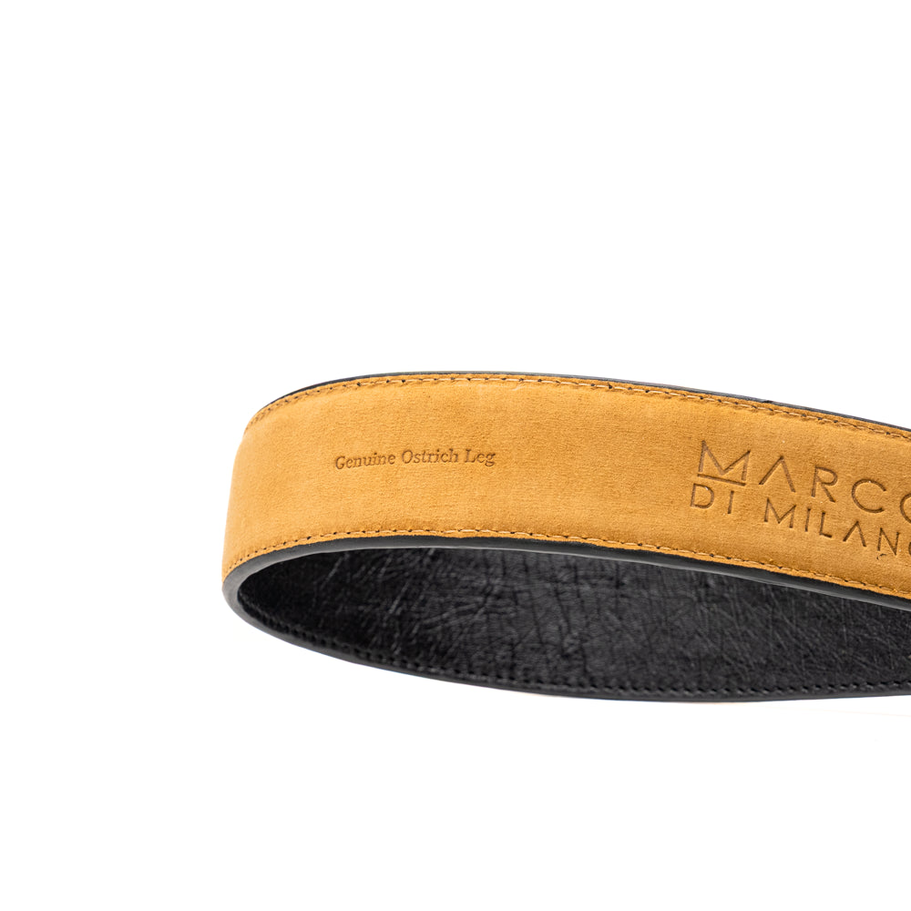 Alessio Belt Black by Marco Di Milano—a handcrafted leather belt in black with a textured finish and a silver buckle engraved with “ATELIER MILANO.” The belt is artfully coiled in a loose loop against a white background.