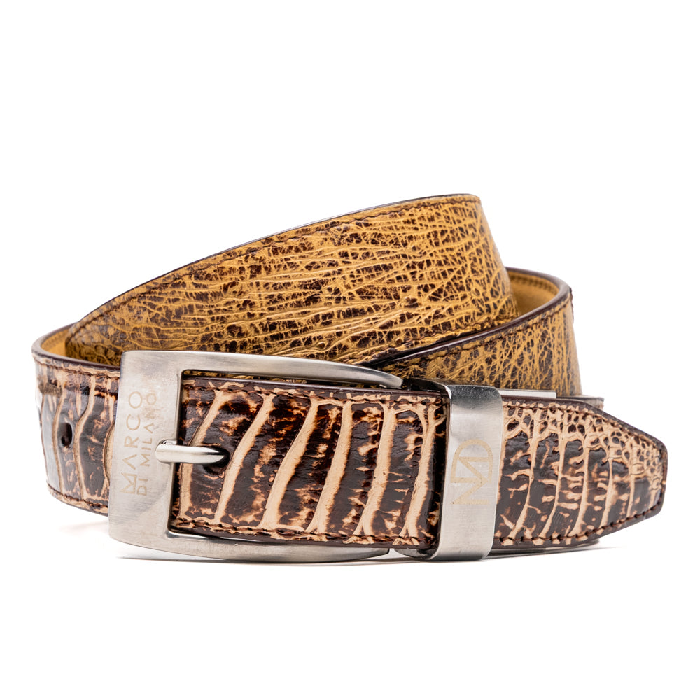 The Alessio Belt Orix by Marco Di Milano, featuring textured genuine ostrich leather in brown and a silver buckle, is coiled to display both its inside and outside surfaces.