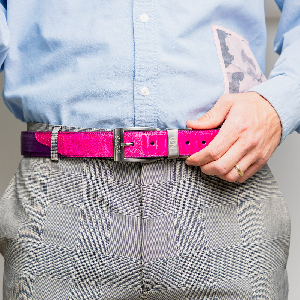 Introducing the Marco Di Milano Alessio Belt in Pink/Purple—a luxurious handcrafted accessory featuring a purple top side and a finely textured bright pink inner side, completed with a meticulously finished silver buckle engraved with the Marco Di Milano logo.
