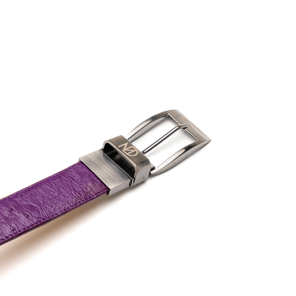 Introducing the Marco Di Milano Alessio Belt in Pink/Purple—a luxurious handcrafted accessory featuring a purple top side and a finely textured bright pink inner side, completed with a meticulously finished silver buckle engraved with the Marco Di Milano logo.