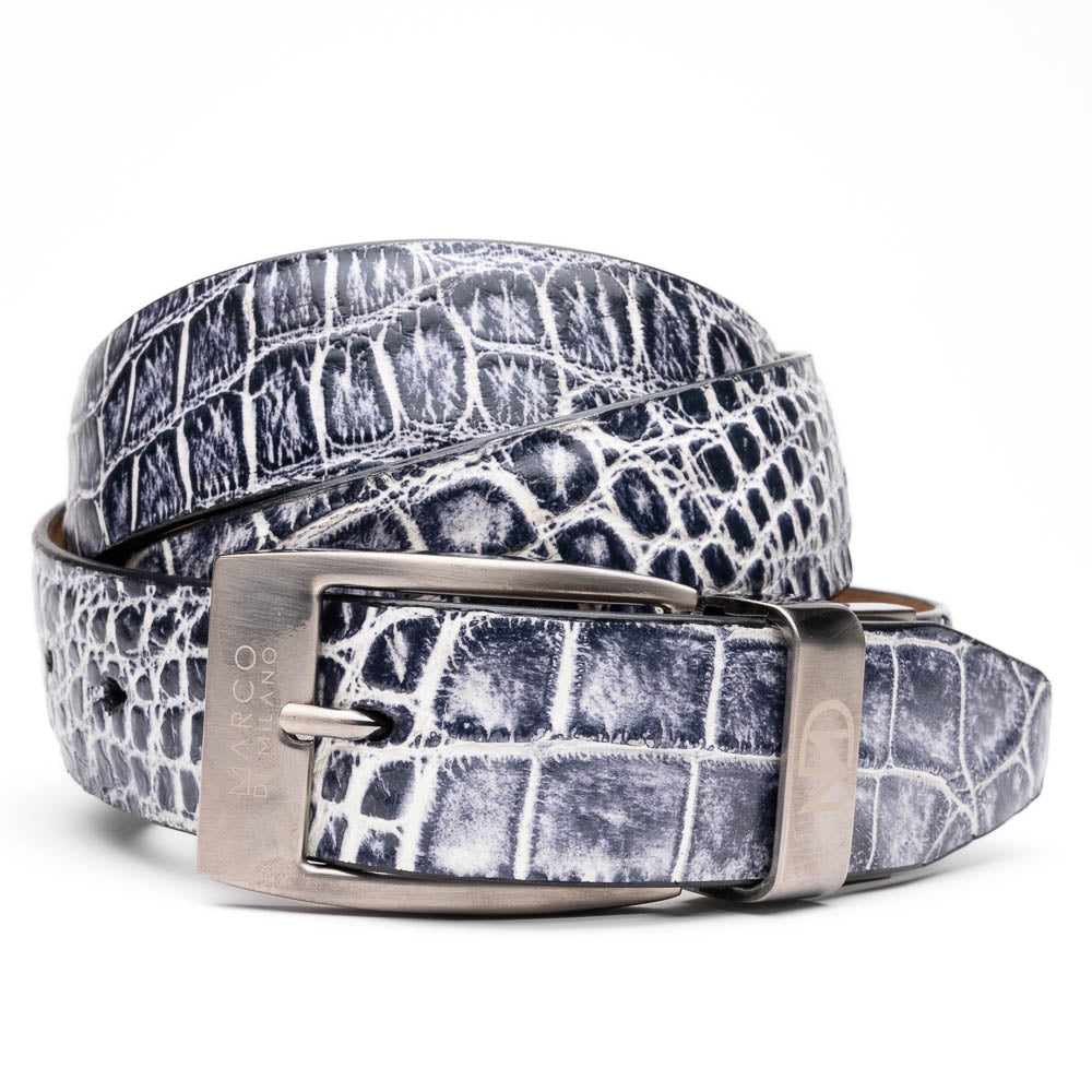 The Emilio Belt Antique Newspaper by Marco Di Milano features a rolled-up design with a silver buckle and textured black-and-white crocodile pattern, making it a standout accessory for those who appreciate exotic leather and refined style.