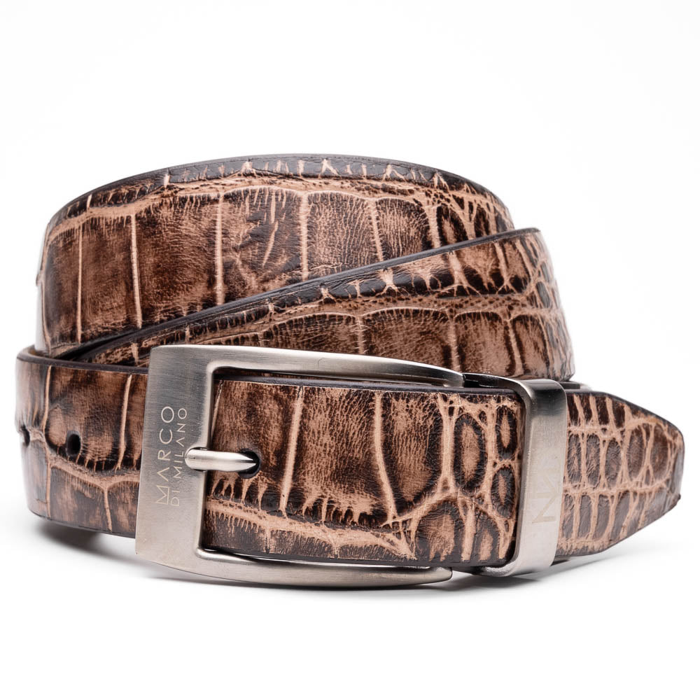 The Emilio Belt Antique Orix by Marco Di Milano features a brown leather crocodile pattern and silver buckle, coiled on a white background, capturing the refined elegance of genuine alligator belts.