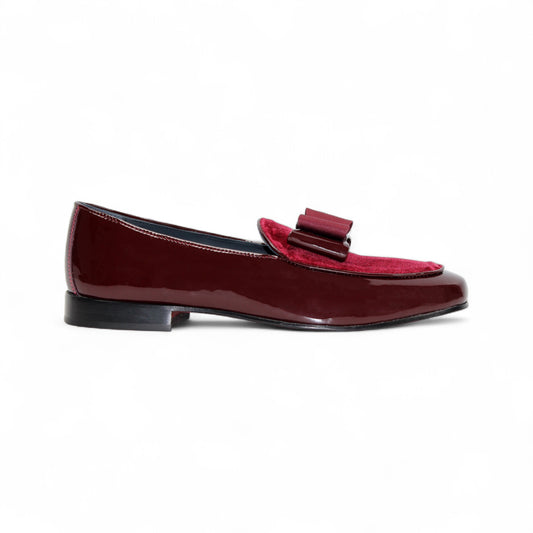 The Duca Di Matiste Amalfi loafer in burgundy patent leather, made in Italy, features a low heel and bow detail on the vamp; shown here in side profile (IN STORE size 14 ONLY, FINAL SALE).