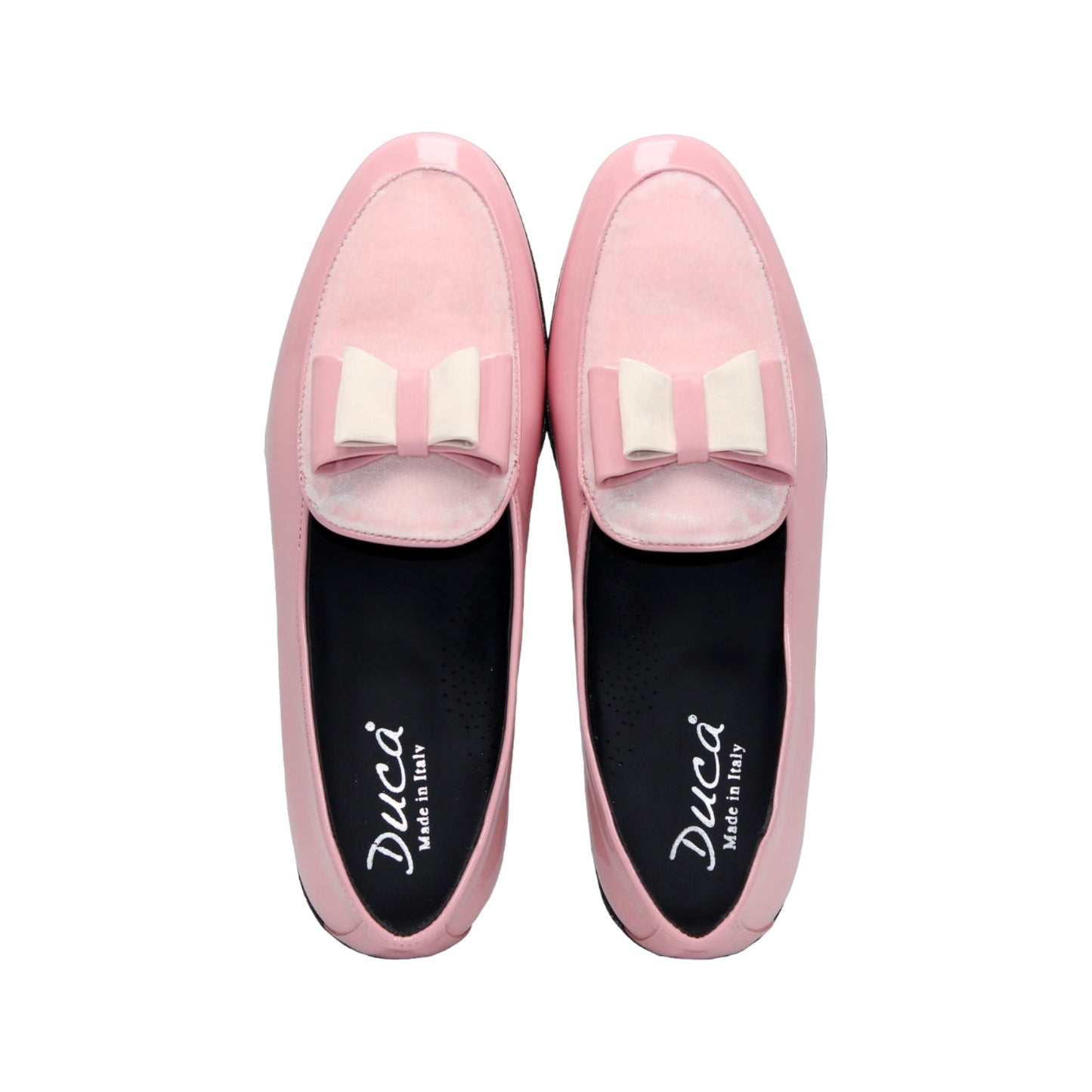 The Duca Amalfi Pink by Duca Di Matiste is a pink patent loafer with a low black heel and a rectangular buckle, inspired by Italian luxury shoes, shown in side view on a white background.