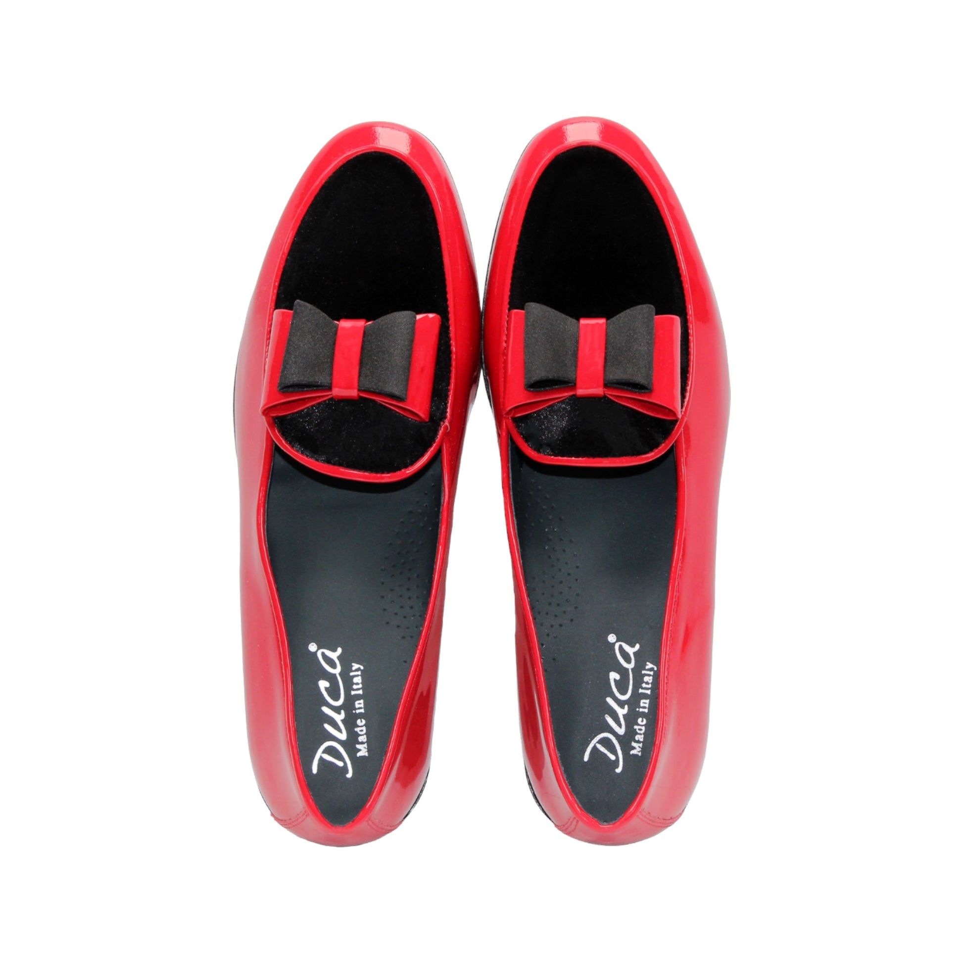 The Duca Red/Black by Duca Di Matiste is a red patent leather shoe with black velvet detail and a black sole, shown in side profile on a white background—an elegant Italian-made design.