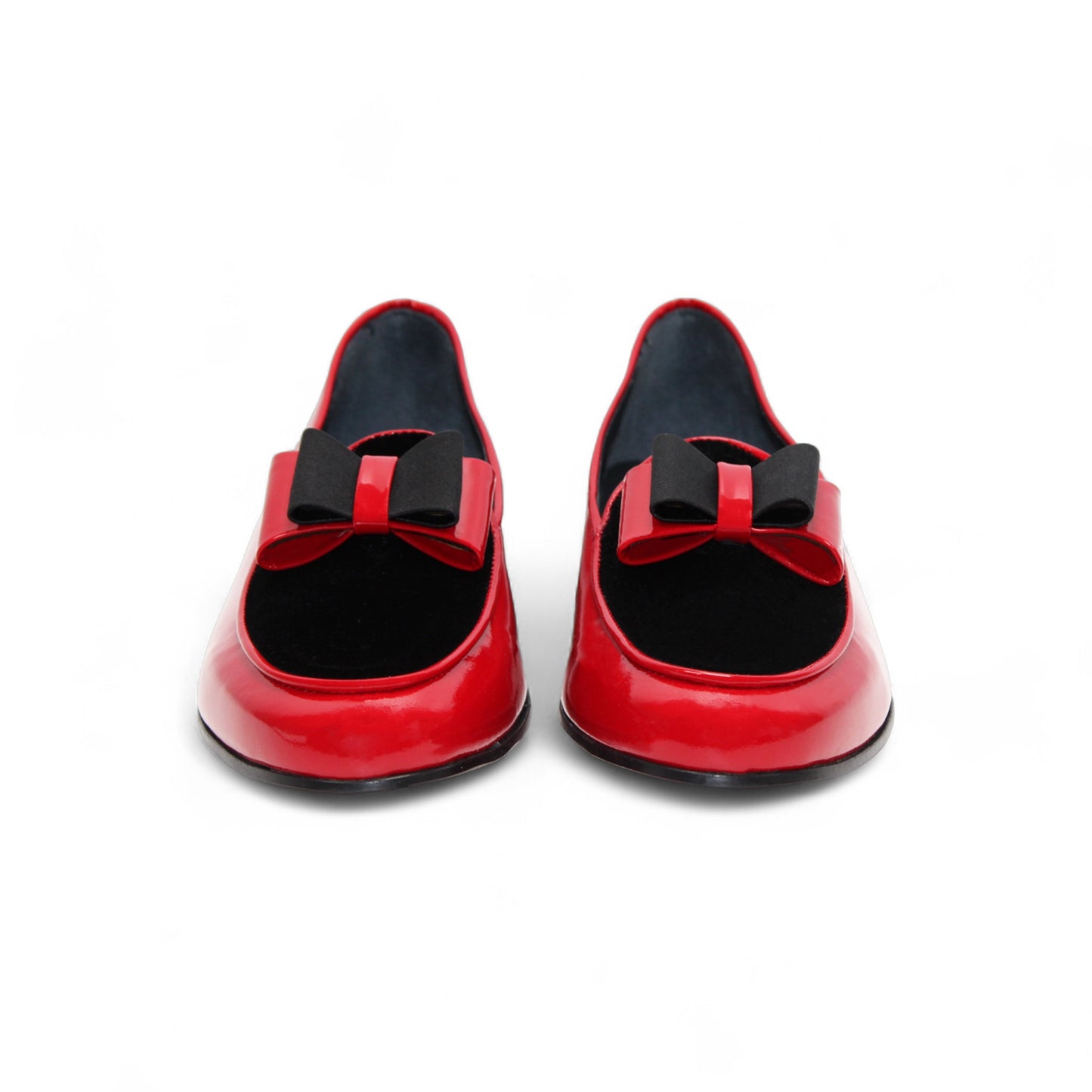 The Duca Red/Black by Duca Di Matiste is a red patent leather shoe with black velvet detail and a black sole, shown in side profile on a white background—an elegant Italian-made design.