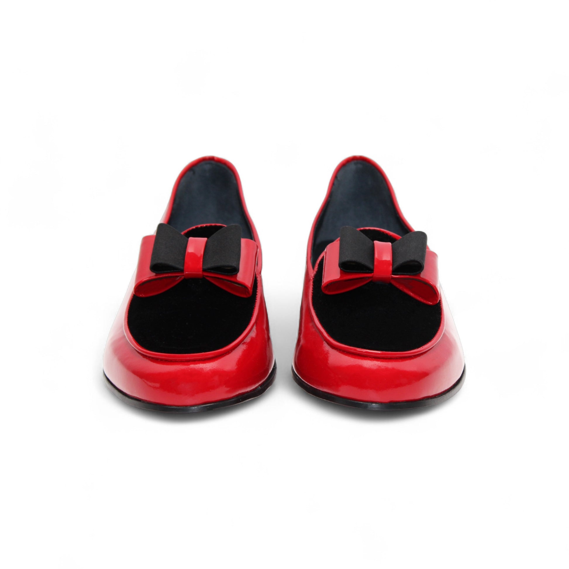 The Duca Red/Black by Duca Di Matiste is a red patent leather shoe with black velvet detail and a black sole, shown in side profile on a white background—an elegant Italian-made design.