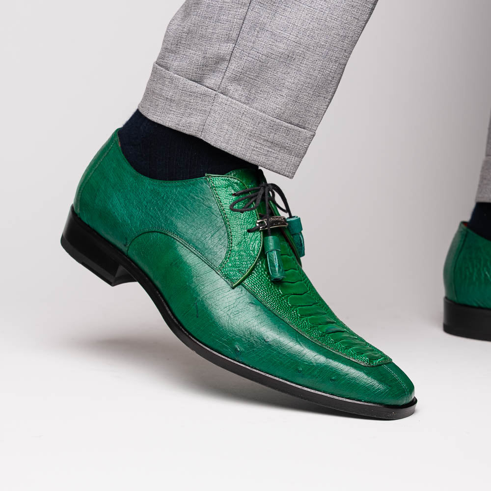 A pair of Marco Di Milano Andretti Lemon Green men's shoes, crafted from genuine ostrich leather with a textured pattern, black laces, and red interior lining—one shoe shown on its side to display the sole.