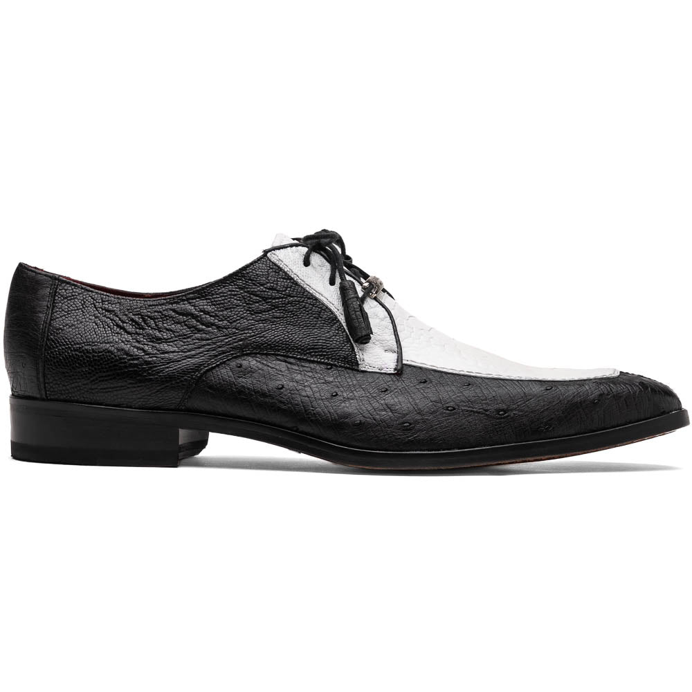 The Andretti White / Black by Marco Di Milano is a black and white leather dress shoe with a textured pattern, black laces, and a brown embossed leather sole—luxury footwear for any occasion.
