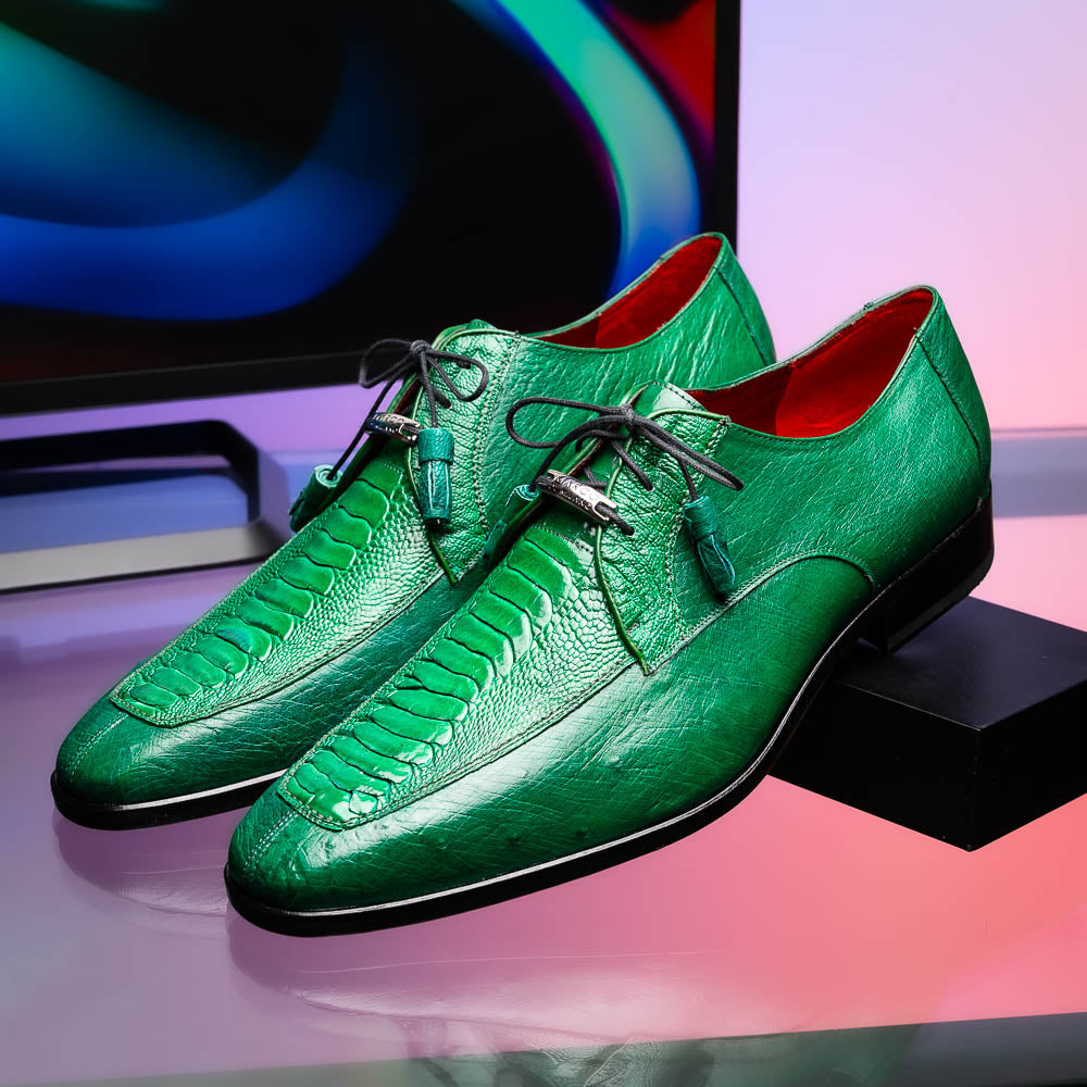 A pair of Marco Di Milano Andretti Lemon Green men's shoes, crafted from genuine ostrich leather with a textured pattern, black laces, and red interior lining—one shoe shown on its side to display the sole.