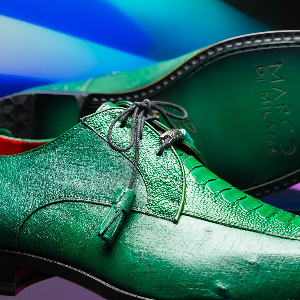 A pair of Marco Di Milano Andretti Lemon Green men's shoes, crafted from genuine ostrich leather with a textured pattern, black laces, and red interior lining—one shoe shown on its side to display the sole.