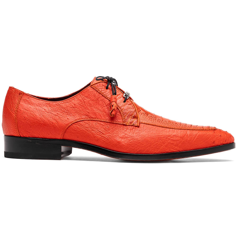 The Andretti Orange by Marco Di Milano are vibrant orange leather dress shoes with black laces and textured detailing, one upright and one showing the branded sole—ideal luxury footwear for men.