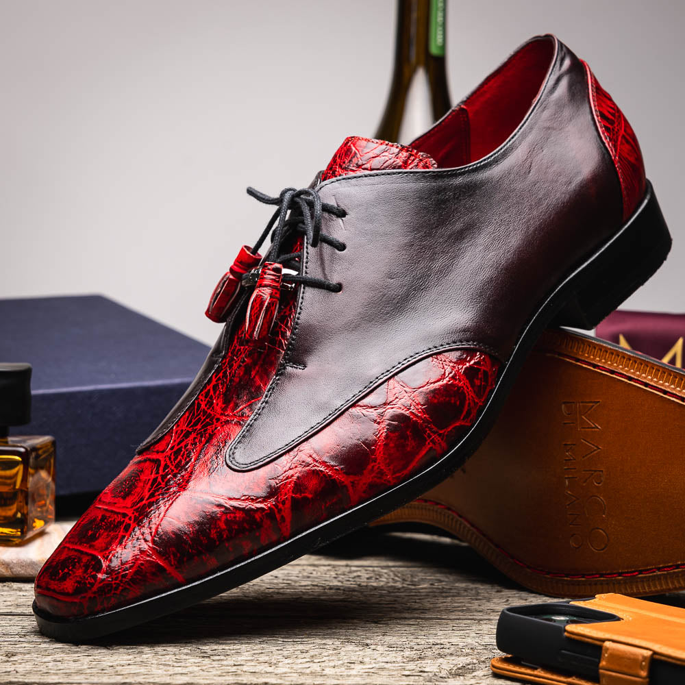 The Marco Di Milano Anzio BlackCherry men’s dress shoes feature a red and black textured leather upper, black laces, and tan leather soles—ideal for those seeking luxury footwear.