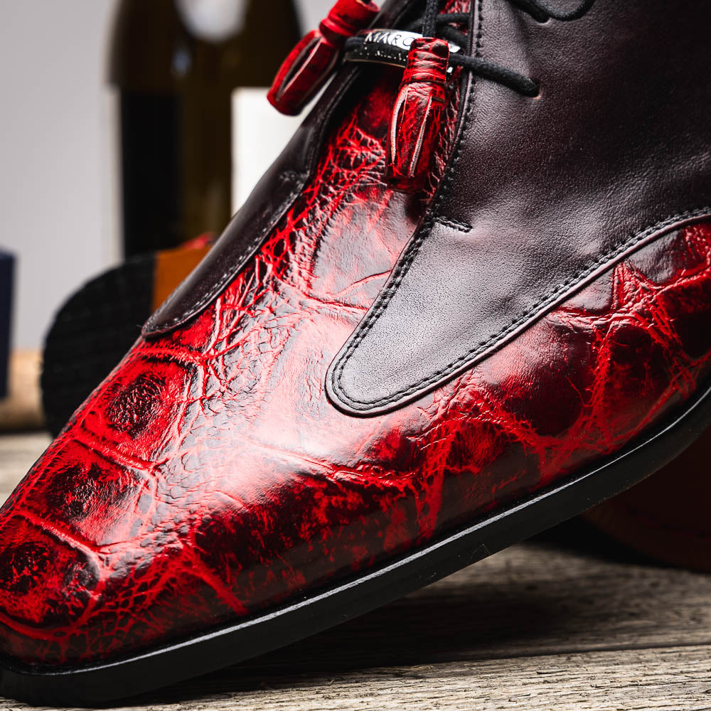 The Marco Di Milano Anzio BlackCherry men’s dress shoes feature a red and black textured leather upper, black laces, and tan leather soles—ideal for those seeking luxury footwear.