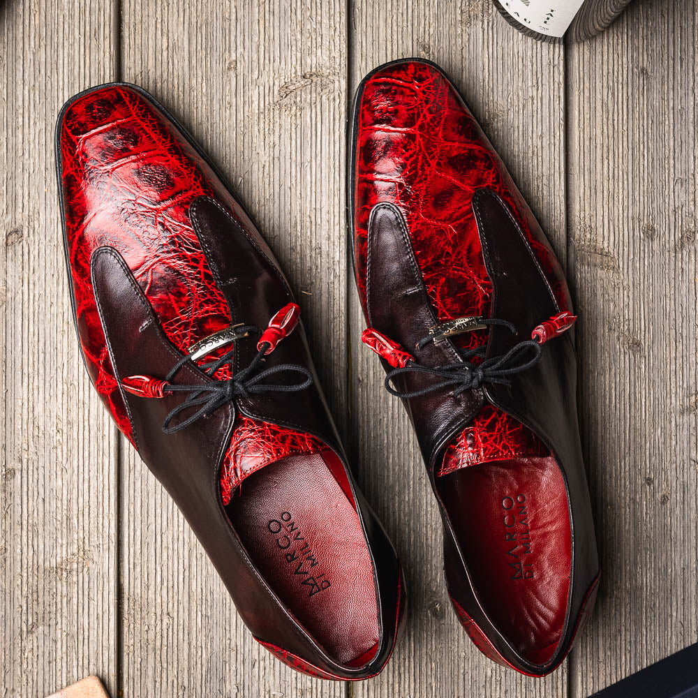The Marco Di Milano Anzio BlackCherry men’s dress shoes feature a red and black textured leather upper, black laces, and tan leather soles—ideal for those seeking luxury footwear.