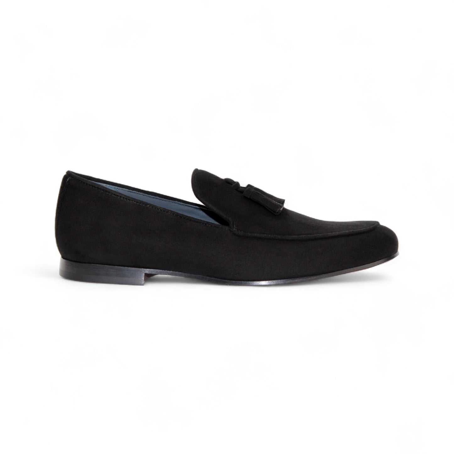 The Duca Di Matiste Duca Anzio Black loafer features premium black suede, a tassel detail, low heel, and rounded toe, shown in a side profile on a white background.