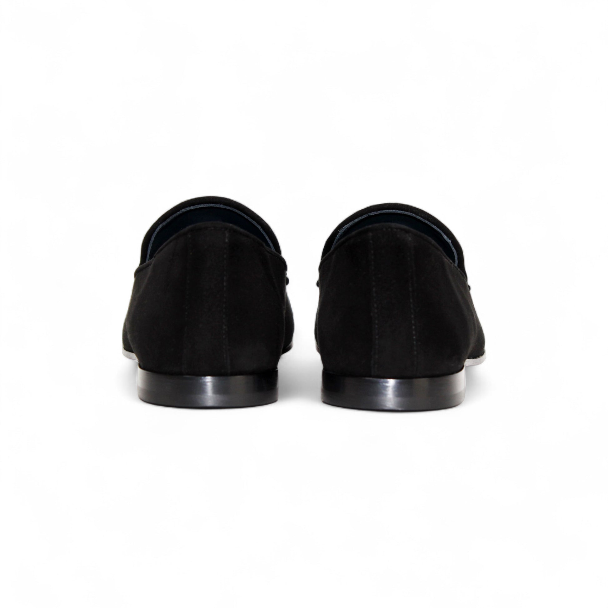 The Duca Di Matiste Duca Anzio Black loafer features premium black suede, a tassel detail, low heel, and rounded toe, shown in a side profile on a white background.