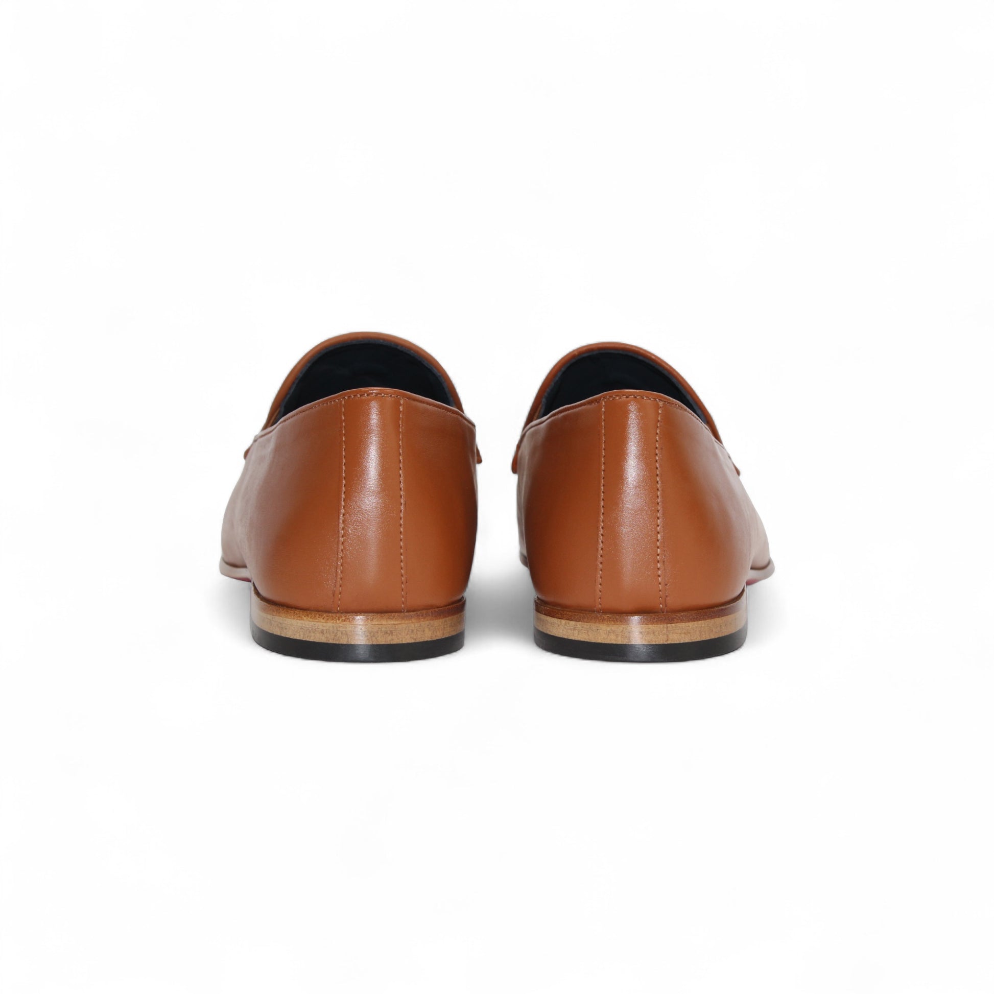 The Duca Di Matiste Duca Anzio Brandy/Bone loafer in brown and beige leather with tassel detail and a suede bottom, shown from the side against a white background.