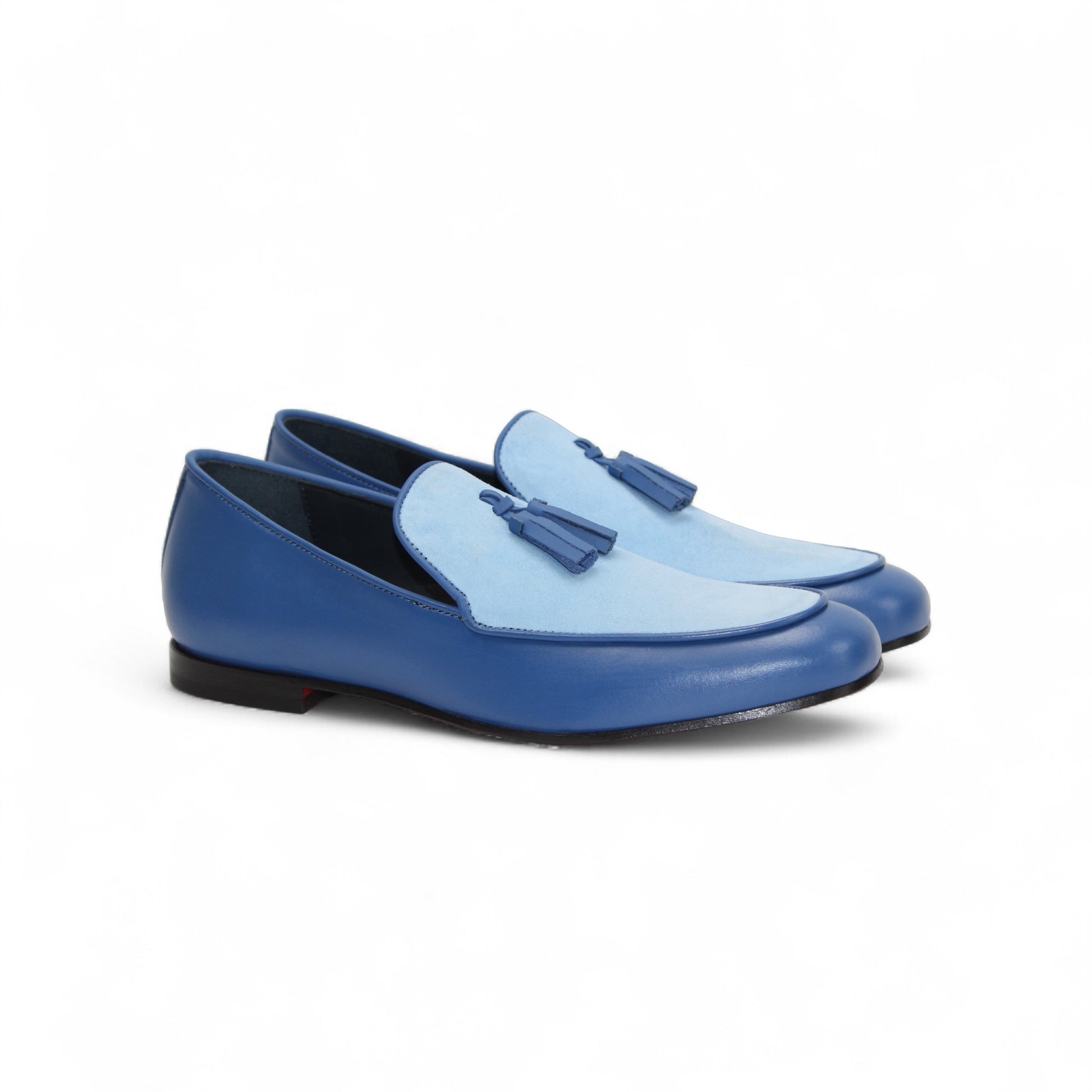 The Duca Di Matiste Duca Anzio Navy/Light Blue is a blue leather loafer with a light blue upper panel and tassel detail, suede bottom, shown in profile on a white background.
