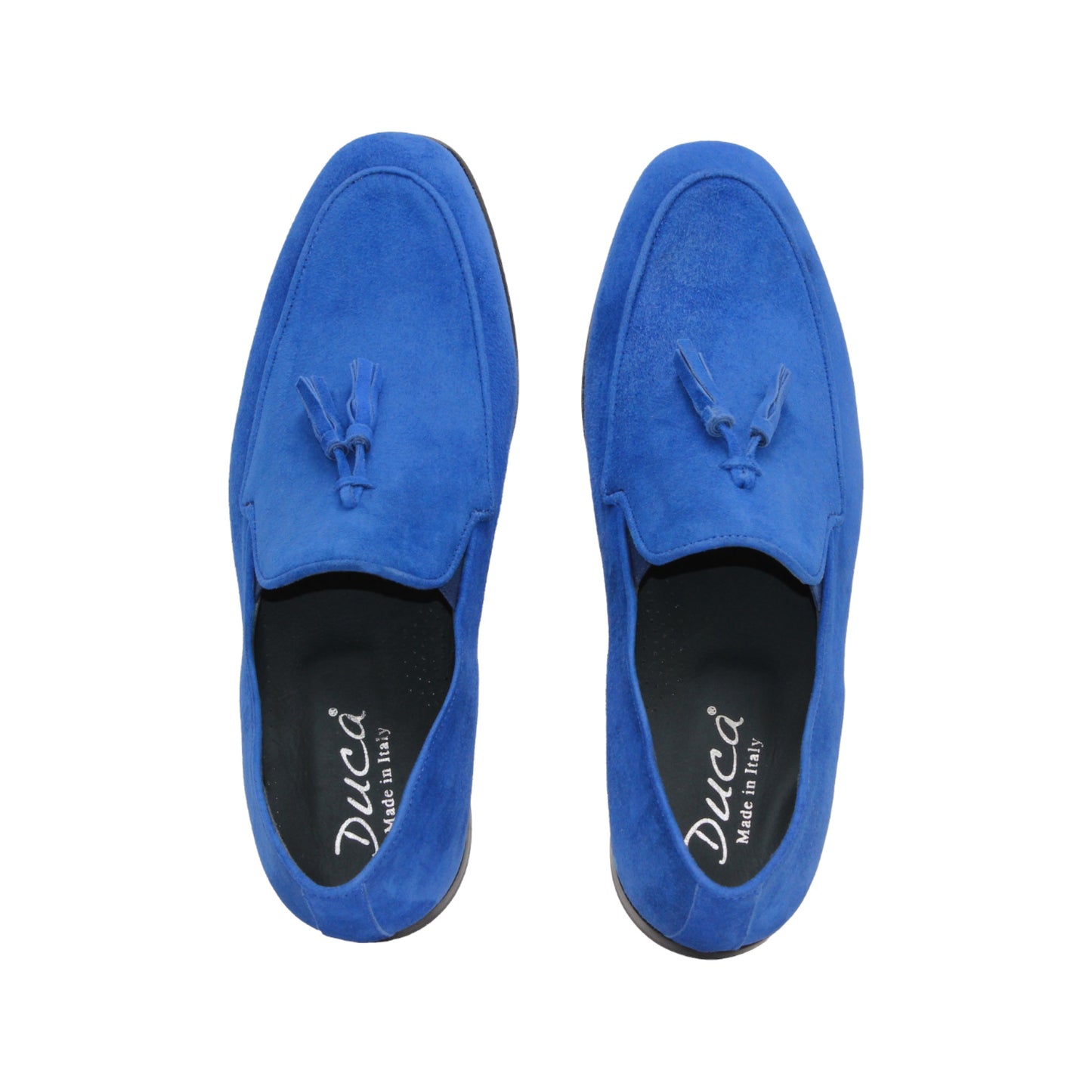 The Duca Di Matiste Duca Anzio Saphire is a blue suede loafer with tassel detailing and a leather sole, made in Italy, shown from the side against a white background.